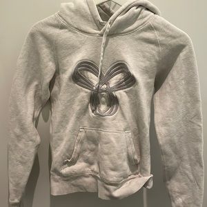 Creme TNA Hoodie with Grey Embroidered Logo
